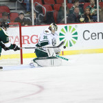 Darcy Kuemper makes a save against the Texas Stars on Nov. 1. (Photo: Reese Strickland - Iowa Wild)