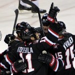 Featured Image: The Huskies celebrate Kalle Kosilla's second-period goal against Minnesota-Duluth on Friday, Dec. 6, 2013. (Photo: St. Cloud State University Athletics)