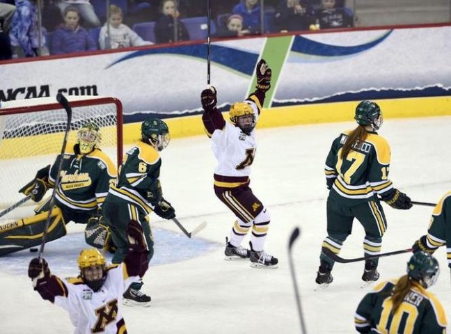 Rachel Bona (center) celebrates Baylee Gillanders' third period goal in Minnesota's game against Clarkson University in the Women's NCAA Ice Hockey Championship at the TD Bank Sports Center in Hamden, CT. Clarkson defeated Minnesota 5-4 for the school's first national title. (Credit: Sean Elliot | NCAA Photos)