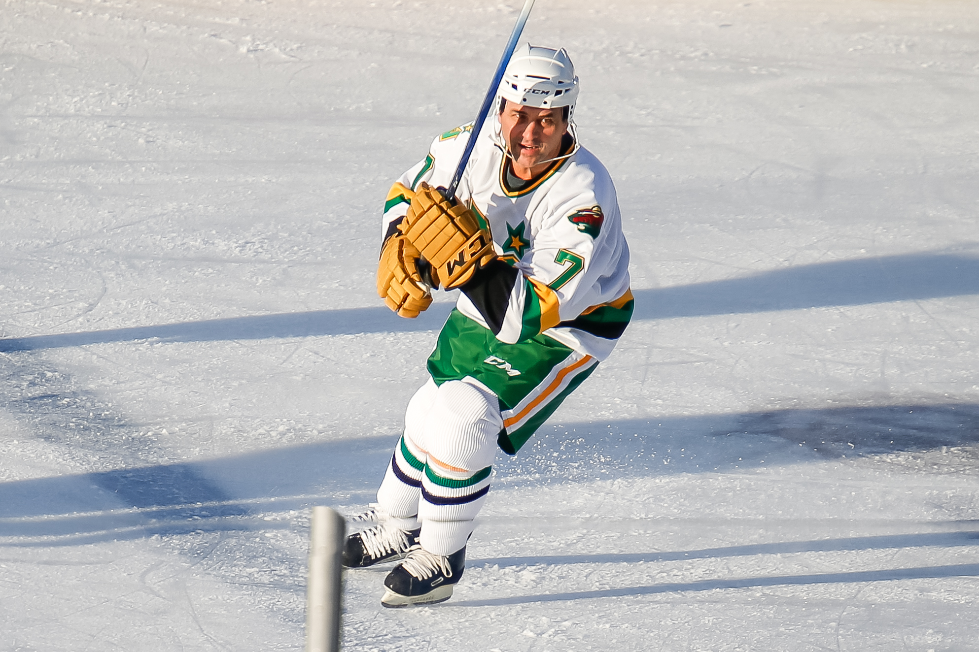 Mike Modano of the Minnesota North Stars skates on the ice as he